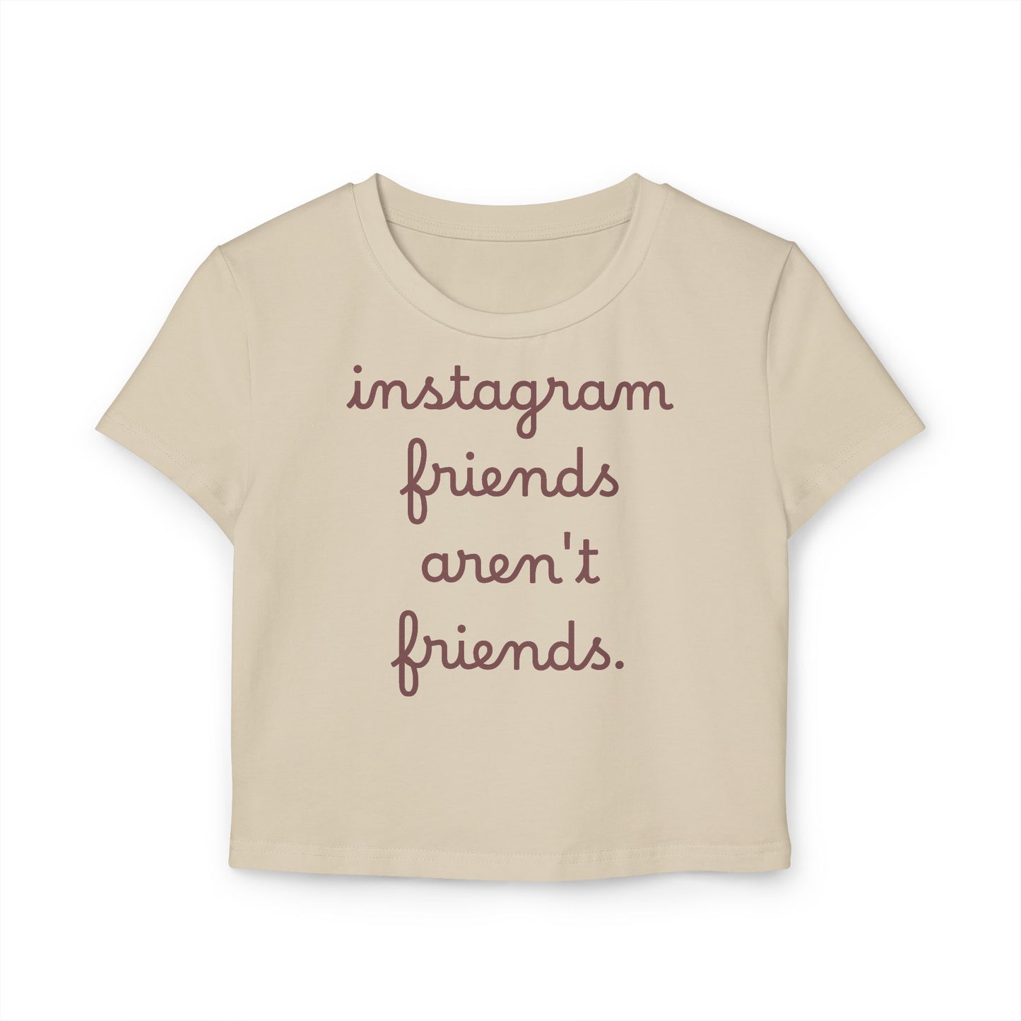 Baby Tee — "instagram friends aren't friends." Cropped Graphic Tee