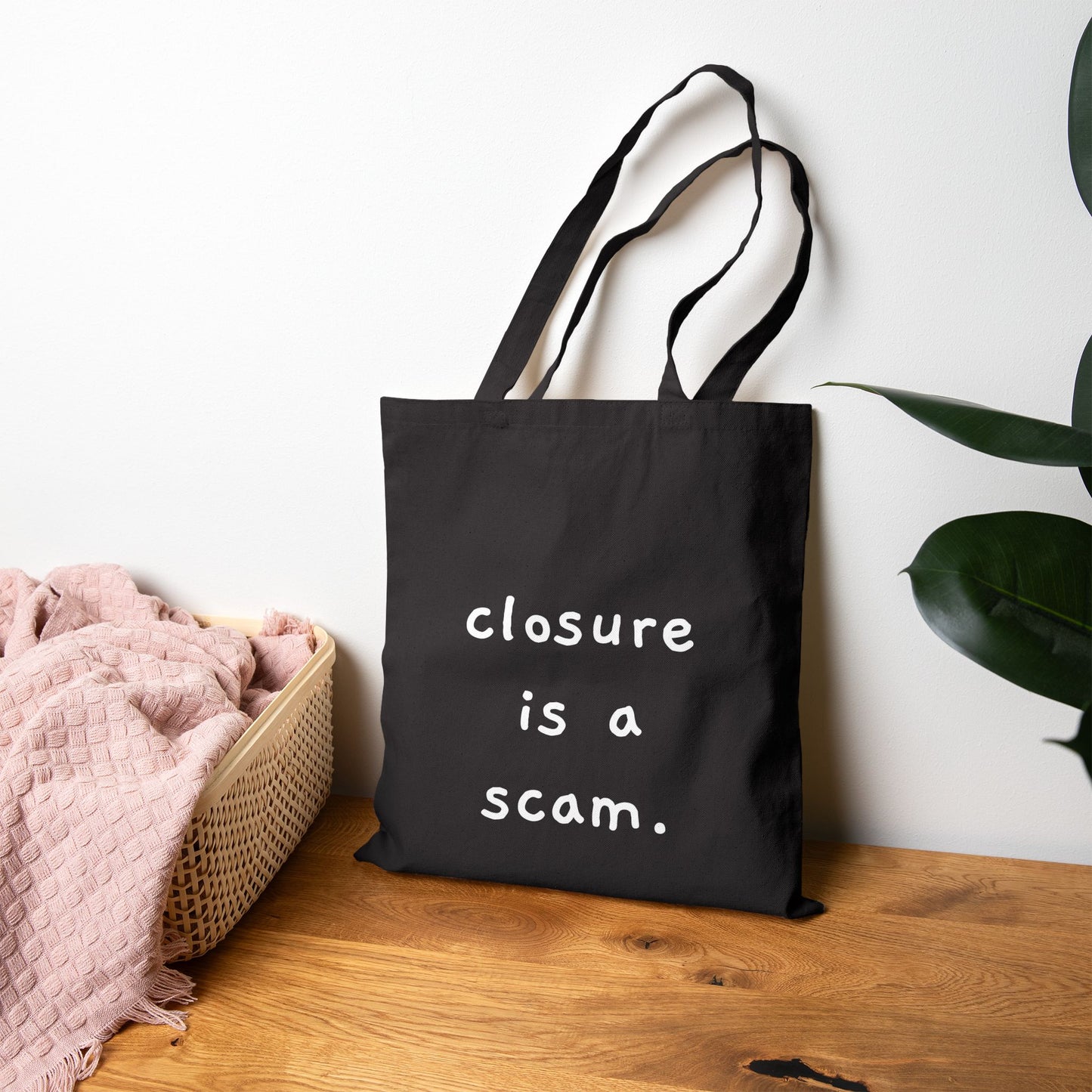“Closure is a scam.” Minimalist Quote Canvas Shopper